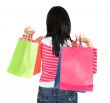 girl in pink holding shopping bags