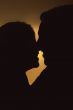 beautiful silhouette of a couple enjoying the sunset