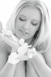 monochrome blond in spa with white rose petals