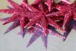 Red stars on shiny surface