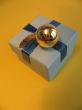 Christmas gift box and golden ball