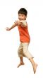 Boy jumps on white background.