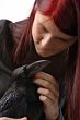 young woman with raven