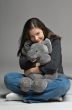 young woman with big toy mouse