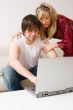 couple using laptop