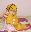  little girl, yellow cap and scarf