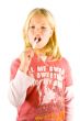 Little girl brushes her teeth