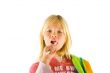 Little girl brushes her teeth