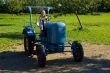 Farmer`s daughter on a tractor