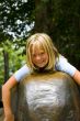 Girl sitting on elephant