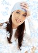 lovely brunette in winter hat with snowflakes 2