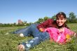 little pretty girl and mother in spring time