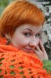 young red-haired woman in red scarf