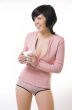 The girl in pink linen with a cup in hands