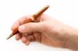 Hand with a pen