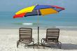 colorful umbrella on empty beach