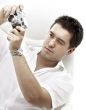 photographer with old rangefinder camera