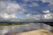 Clouds over big river.