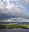 Clouds over big river.