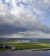 Clouds over big river.