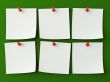 Sticker notes isolated on the green background