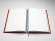 Empty pages of open notebook isolated on white background