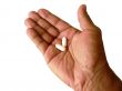 aspirin in open hand