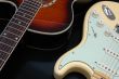 Closeup of 2 guitars