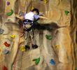 Little boy Climbing A Wall