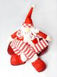 sitting santa claus toy with long legs