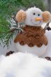 Christmas snowball on a snow with a fur-tree