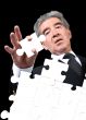 business man solving a puzzle