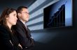 business partners watching their success
