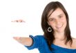 beautiful casual girl holding a business card