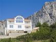 Stone cottage in mountains