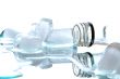 Empty bottle with ice