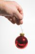 Holding a Christmas Ornament
