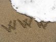Inscription on sea sand WWW