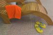 sunbed with towel  and yellow sandals near closeup