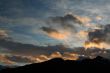 Sunset with clouds and mountains