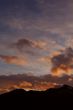 Sunset with clouds and mountains