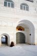 Beggar near the entrance into the monastery