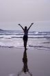 WOMAN LOOKING AT SEA
