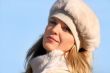 Blond girl in a fur hat