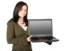 girl smiling with a laptop on her hands