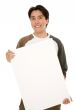 friendly man holding a white board