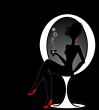elegant  woman silhuette sitting on design chair