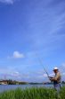 Fisher with long rod
