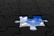 black puzzle with a piece missing