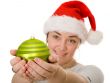 beautiful santa holding a christmas bauble